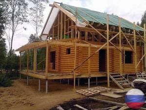 фото Деревянный дом на винтовых сваях своими руками