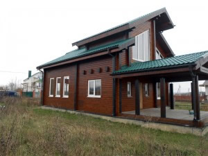 покраска дома из клееного бруса
